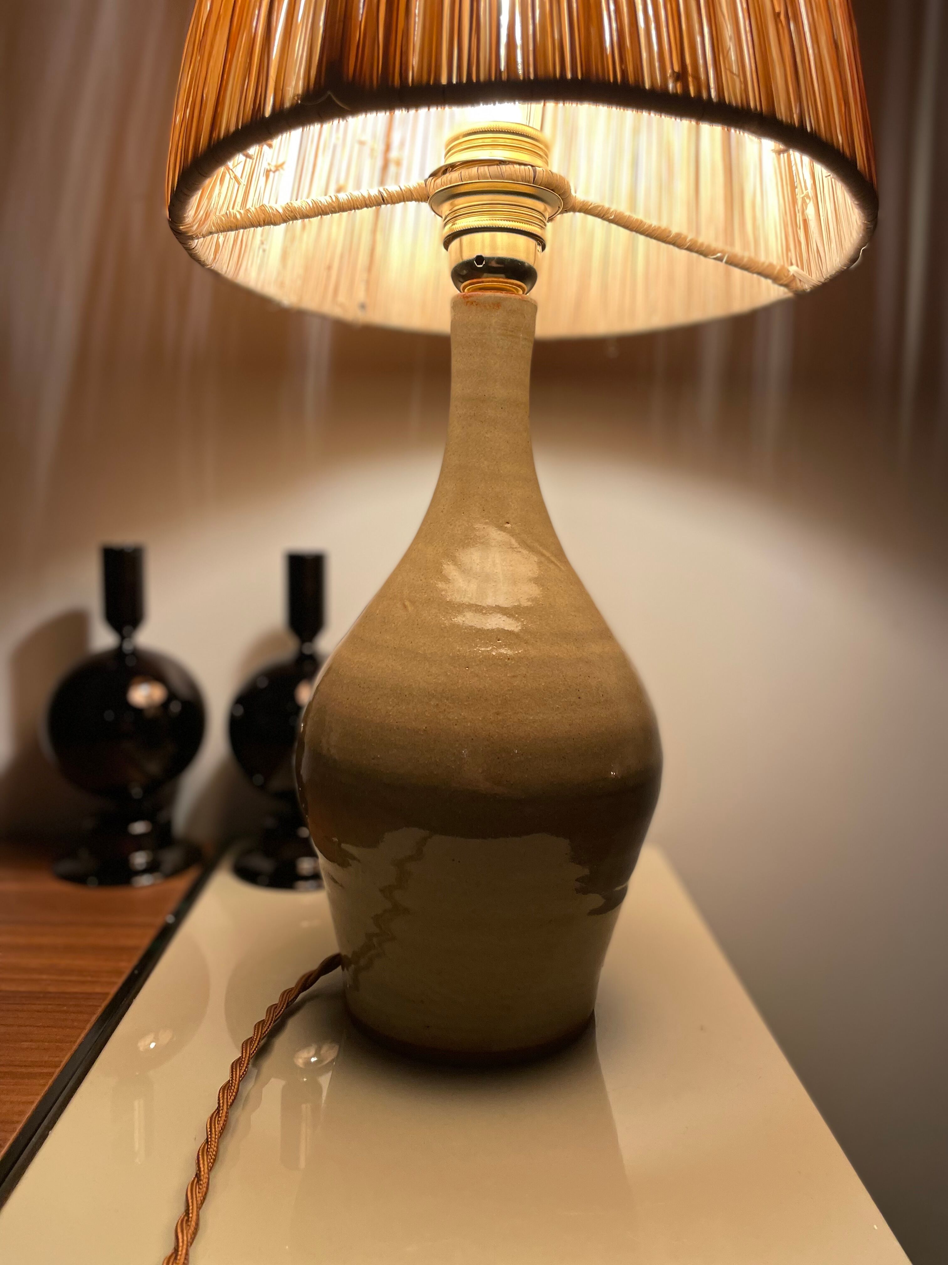 Lamp in stoneware and raffia electrified to nine