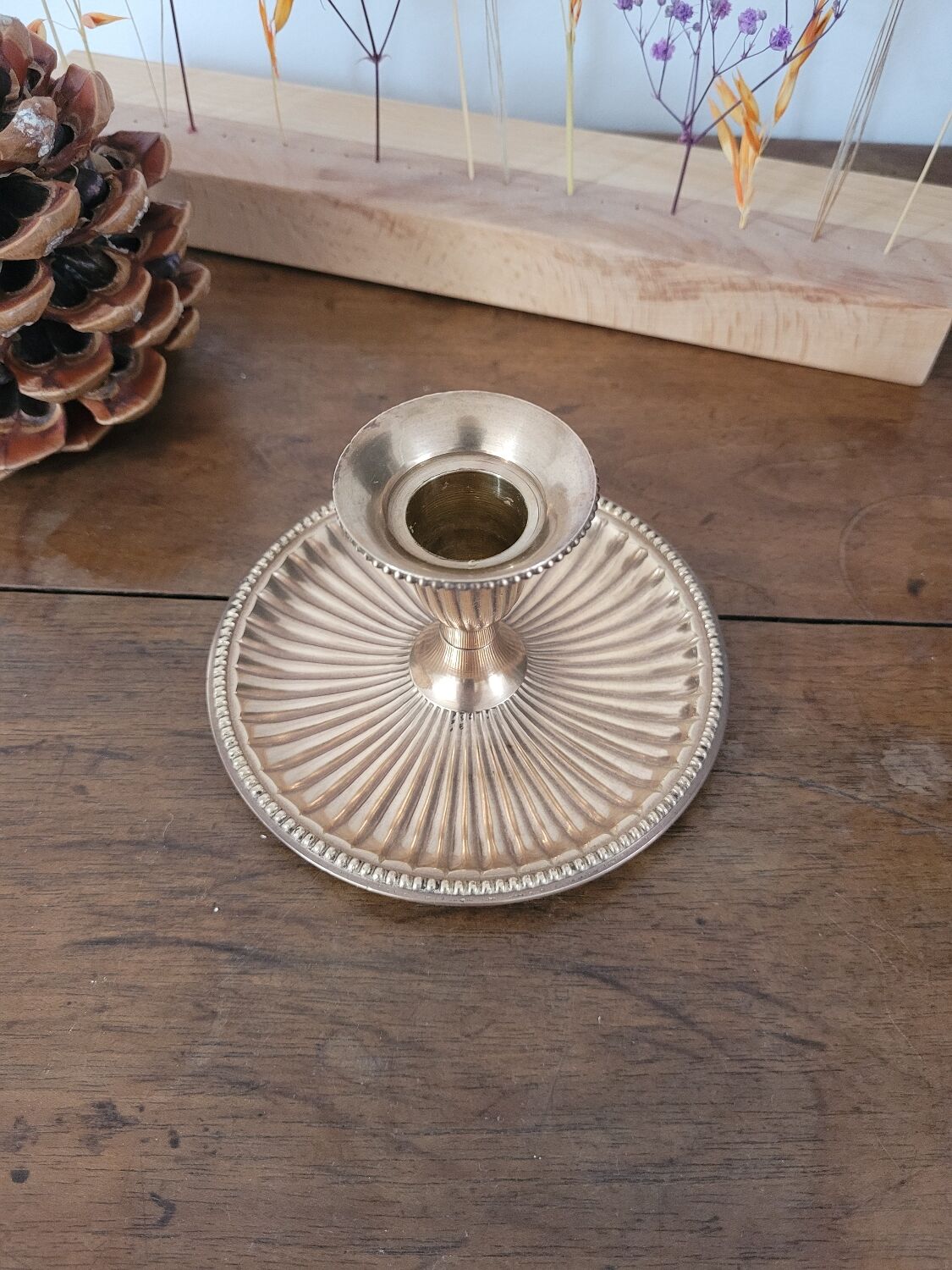 Brass candlestick with a ribbed dish