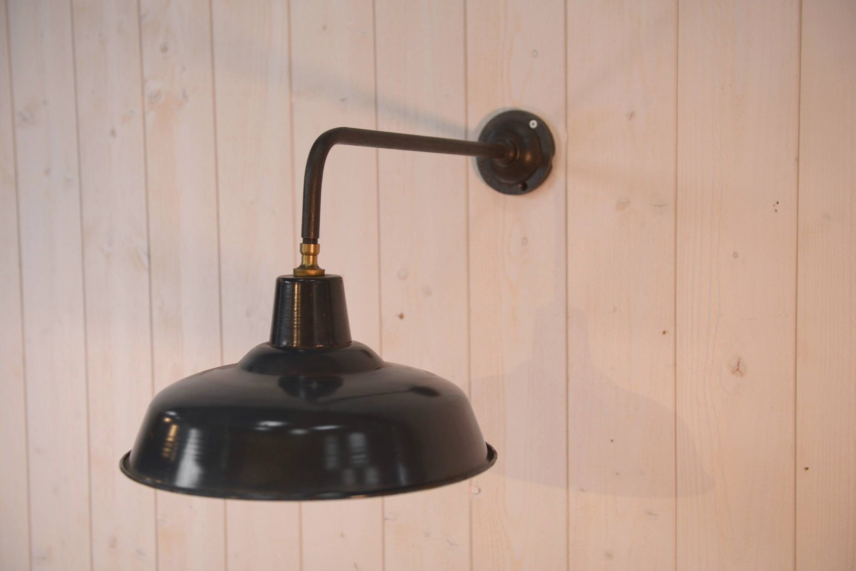 Antique cast iron wall bracket and enamelled globe, 1950s