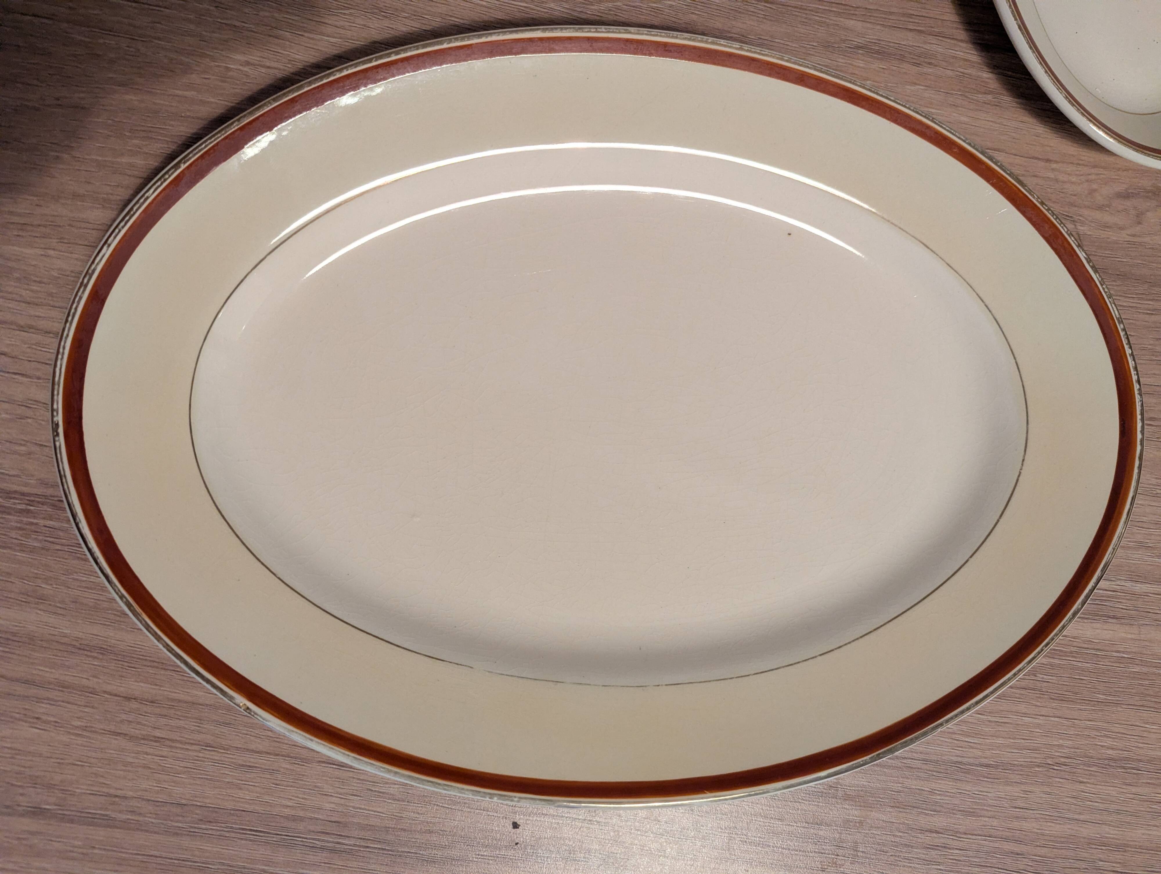 Large Longchamp set in France in earthenware Tea service, serving pieces