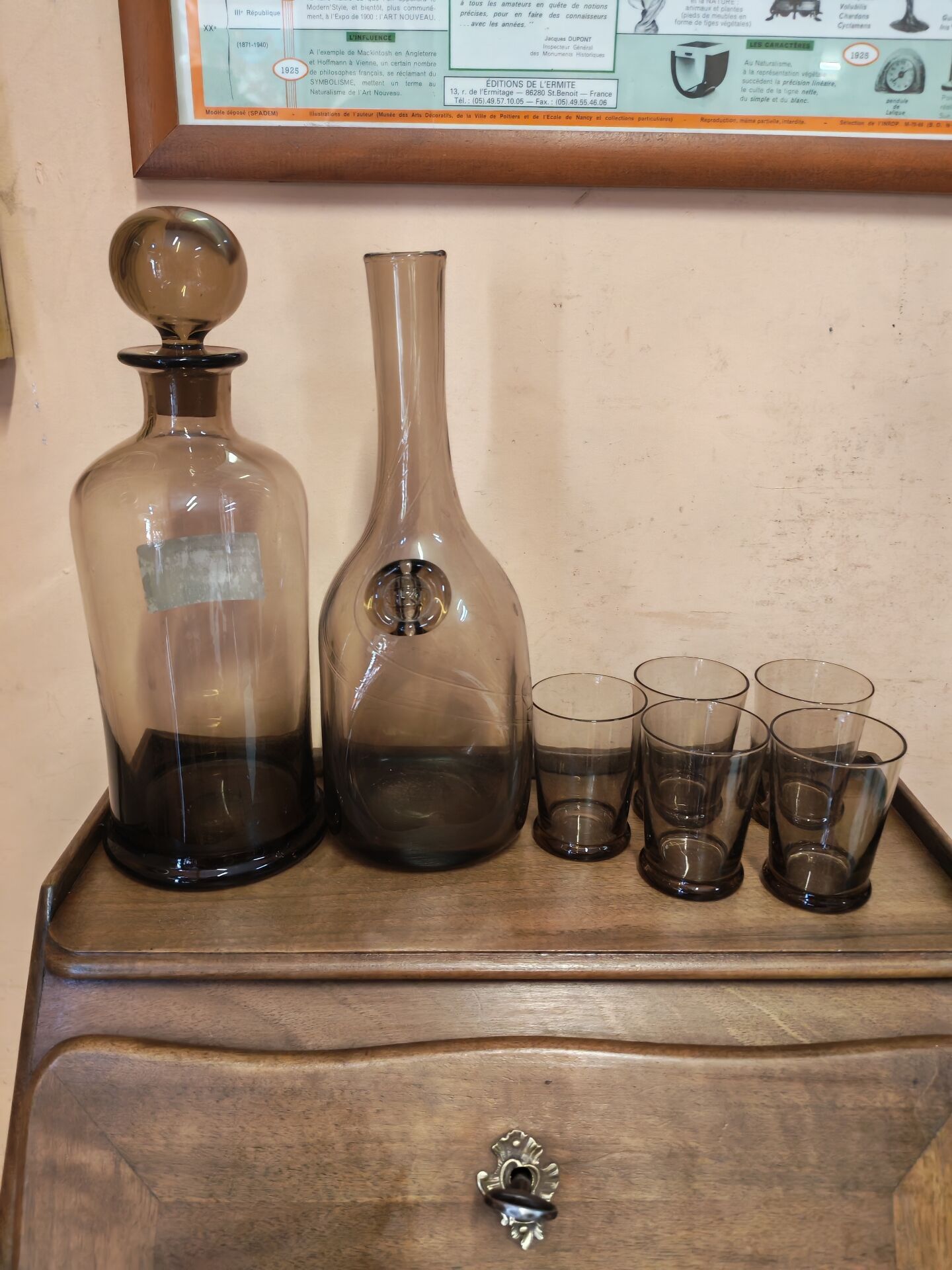 Table service set with a carafe, bottle, and 5 glass cups.