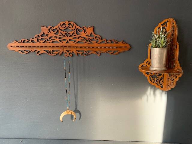 Old wall corner shelf in cut wood from the 1900s