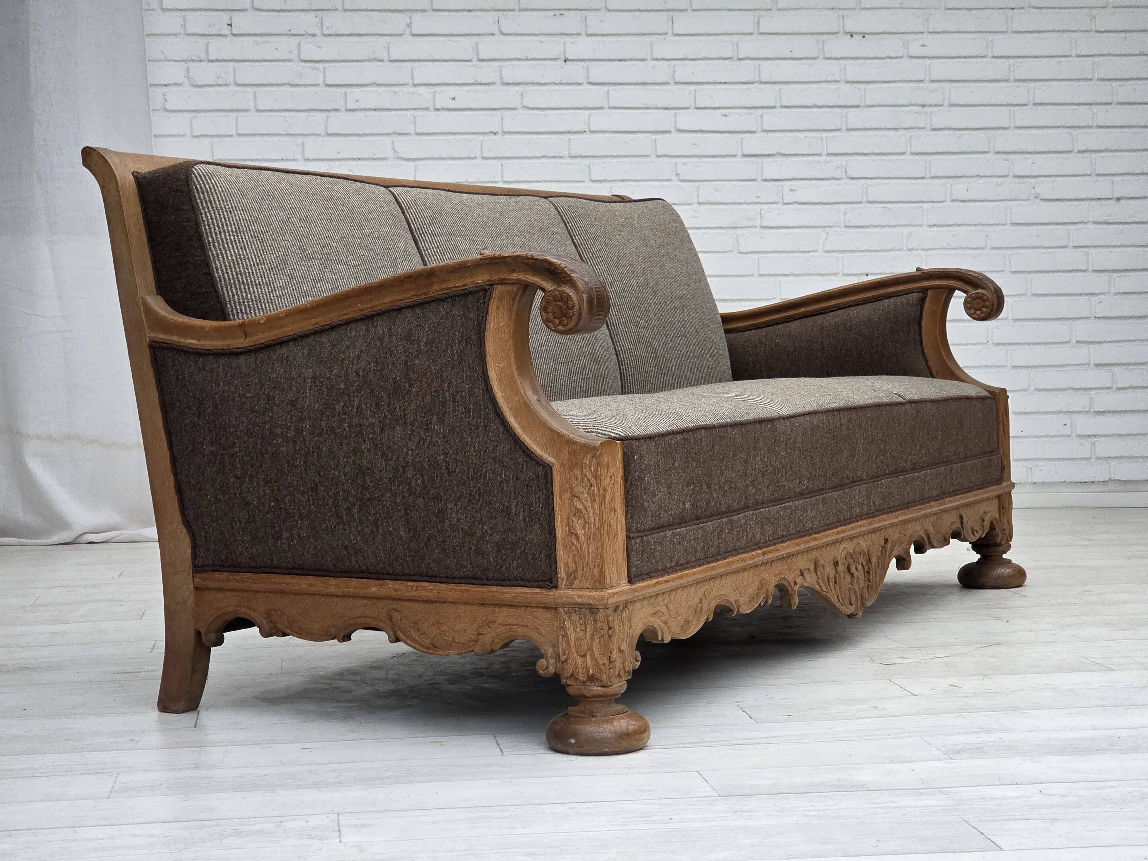 1950s, Danish 3-seater sofa, furniture wool, solid carved oak wood.