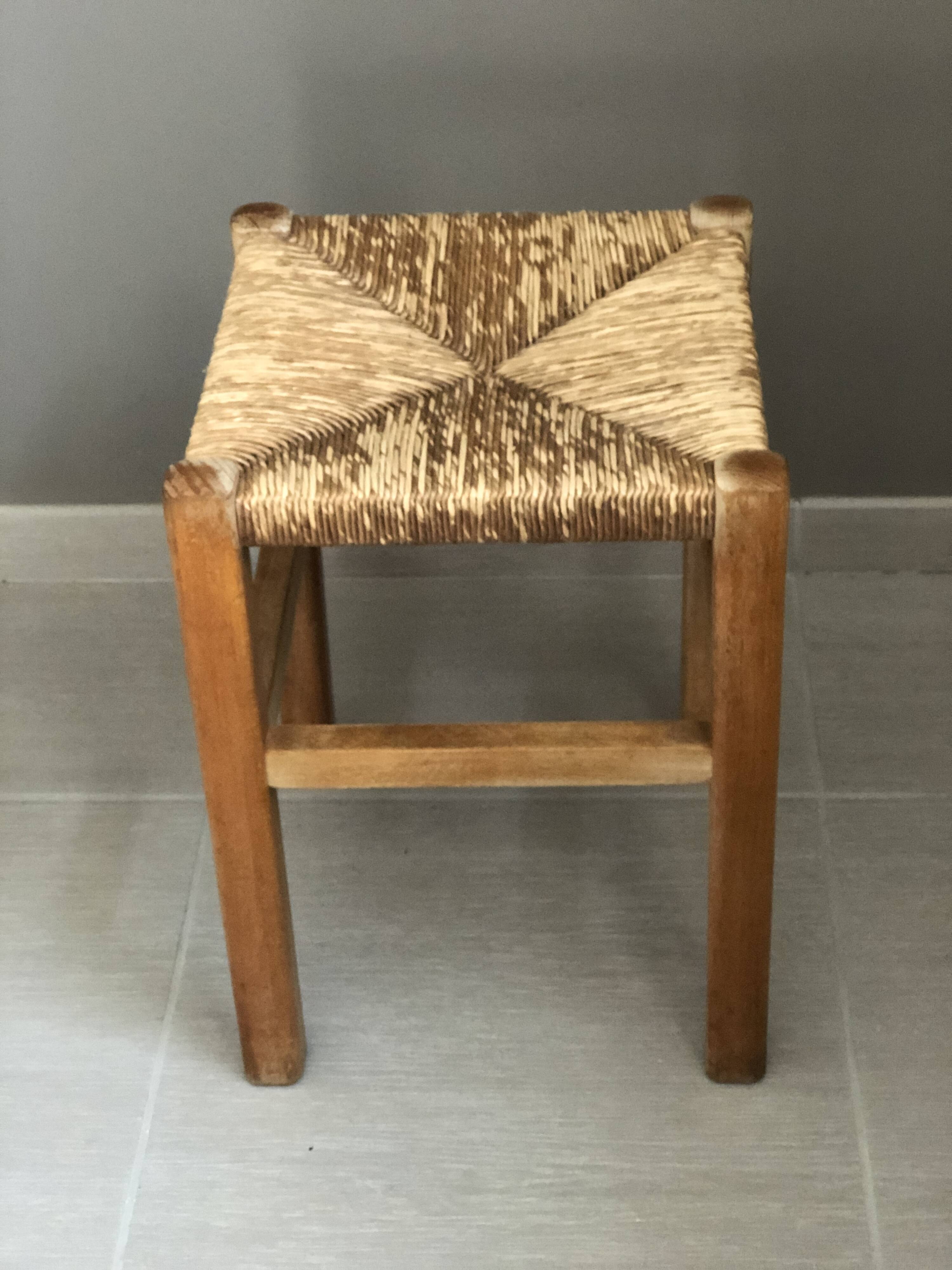 Wooden stool with straw seat