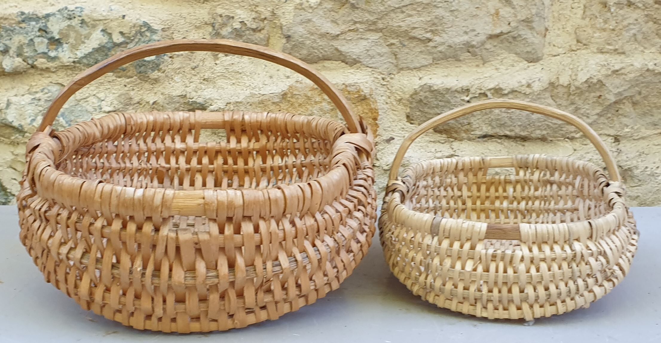 Duo of old small wicker baskets