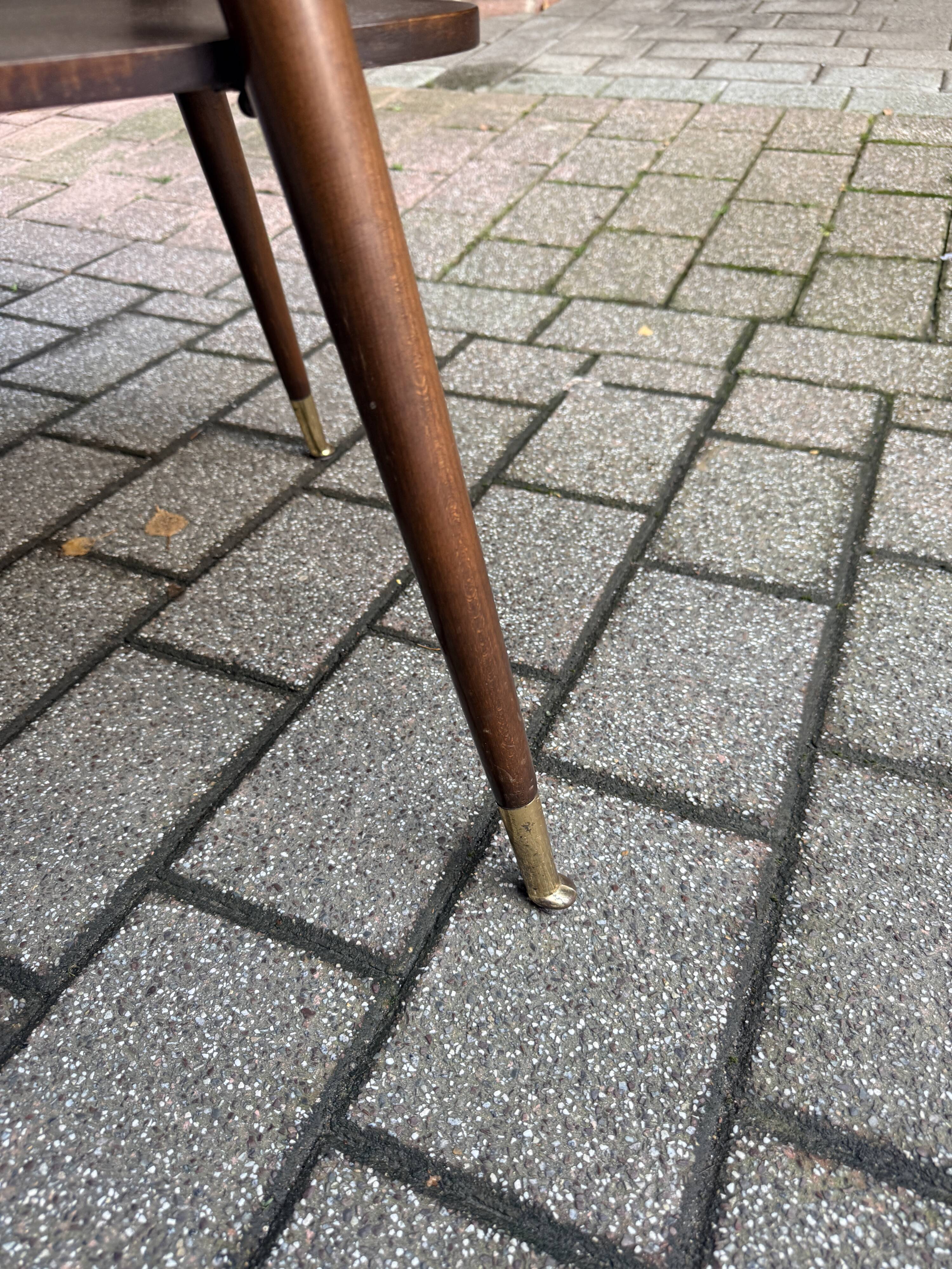Black glass and wood coffee table