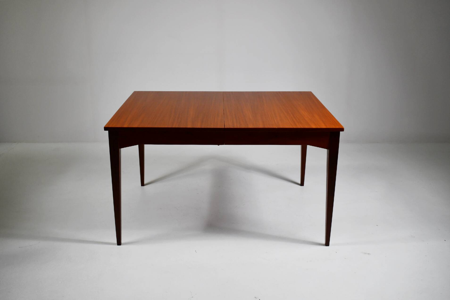 Large teak dining table. 1960s.