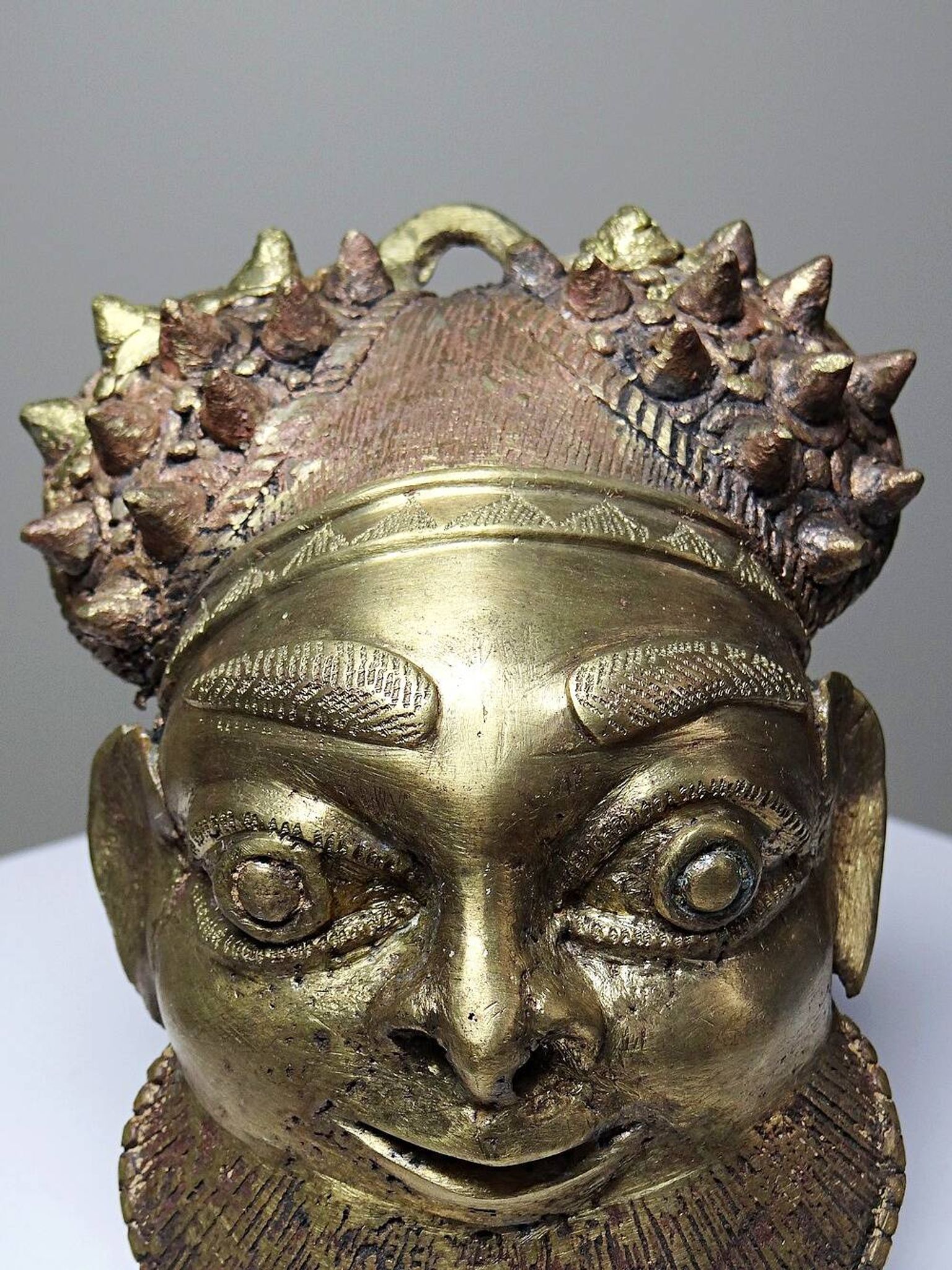 Small gilded bronze Oba mask from Bamoun, Cameroon, vintage Africa
