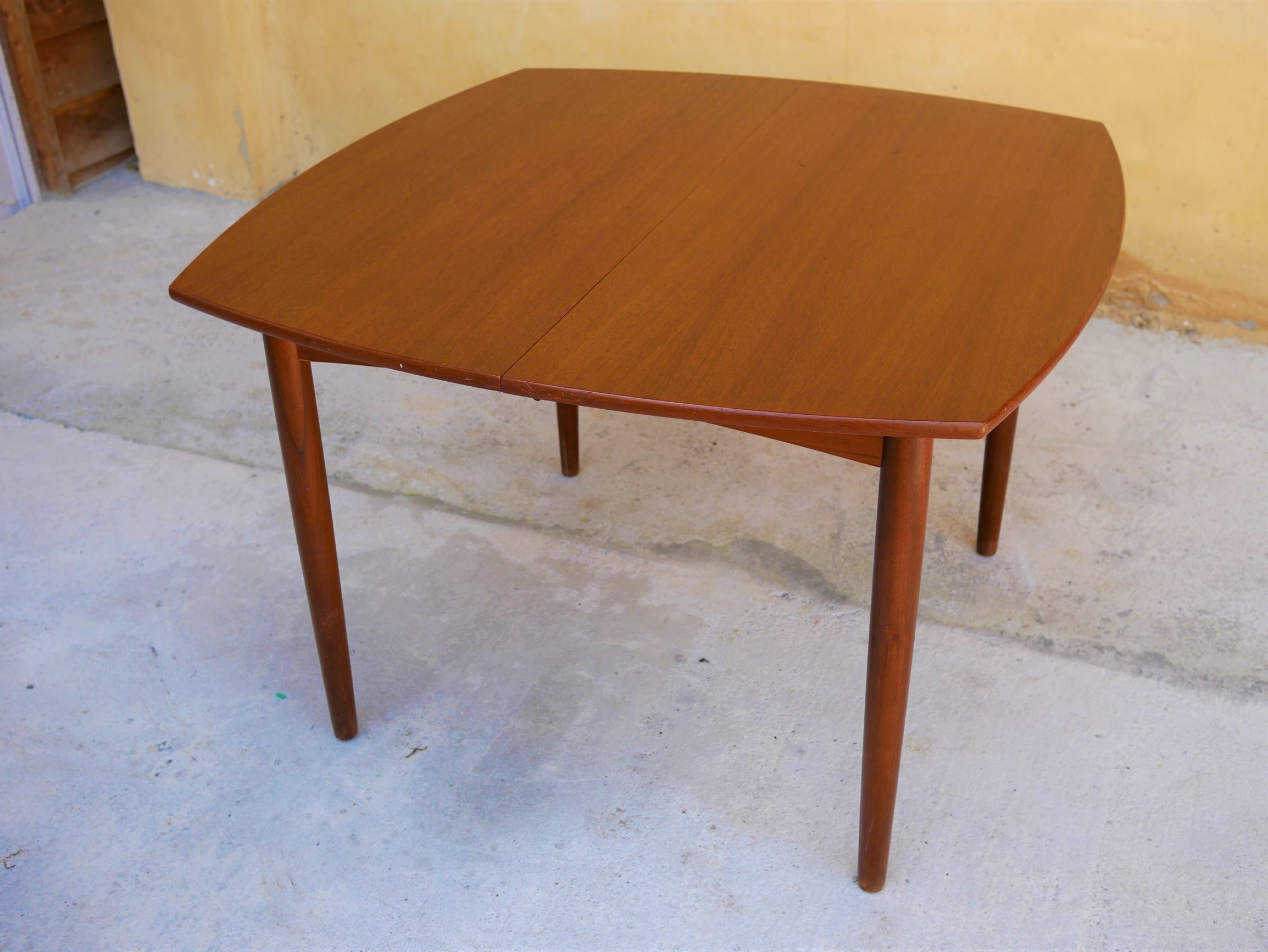 Scandinavian dining table extendable teak by Henry Walter Klein
