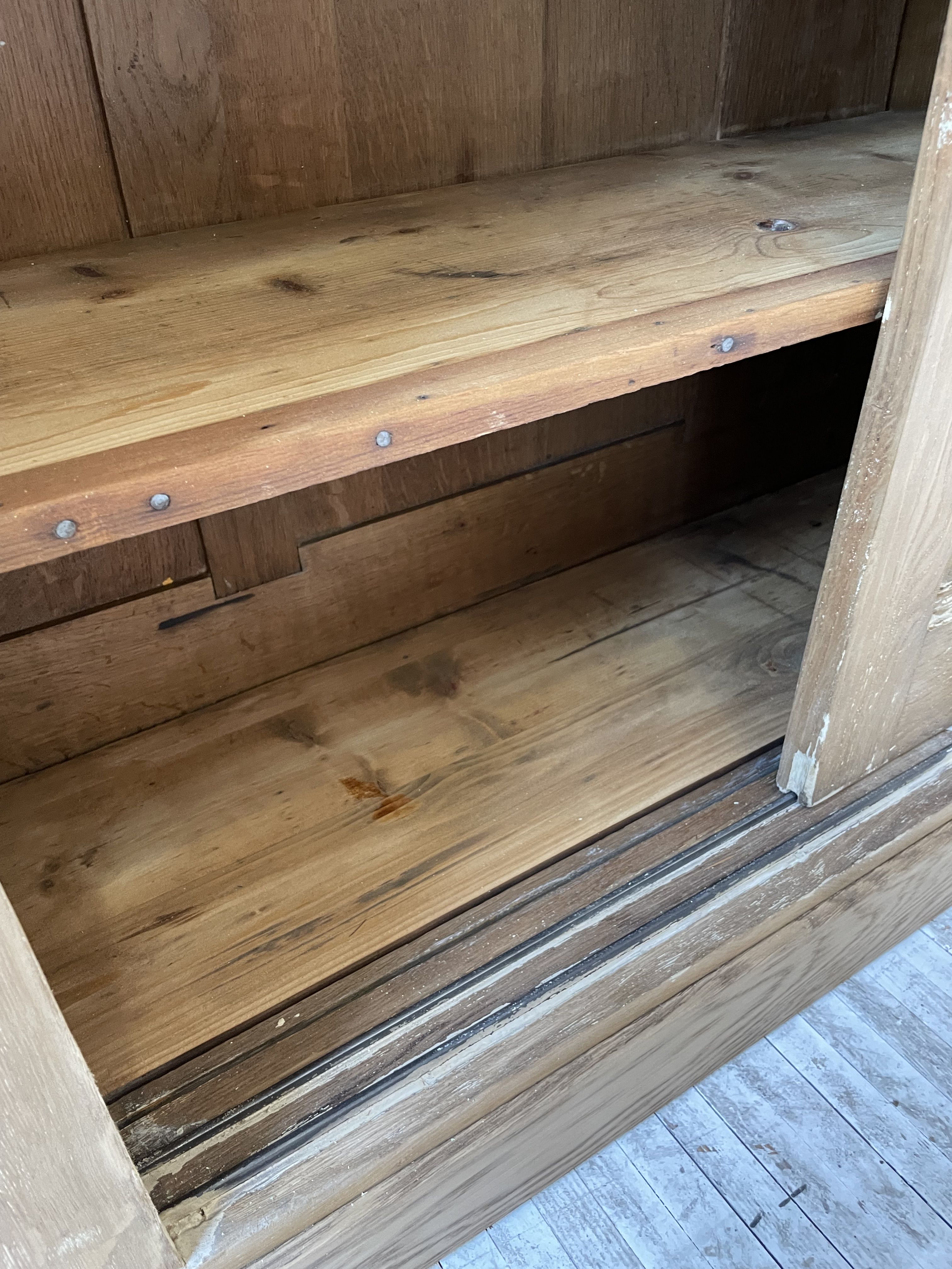 Large row of solid oak loom sliding doors