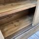 Large row of solid oak loom sliding doors