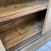 Large row of solid oak loom sliding doors