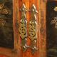 Antique Chinese armoire hand-carved around 1880 with country-style handles.