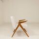 Vintage armchair in rustic oak with pearl bouclé, designed by Chierowski.