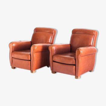 Pair of leather club armchairs, France, 1960s