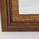Wood and rattan mirror