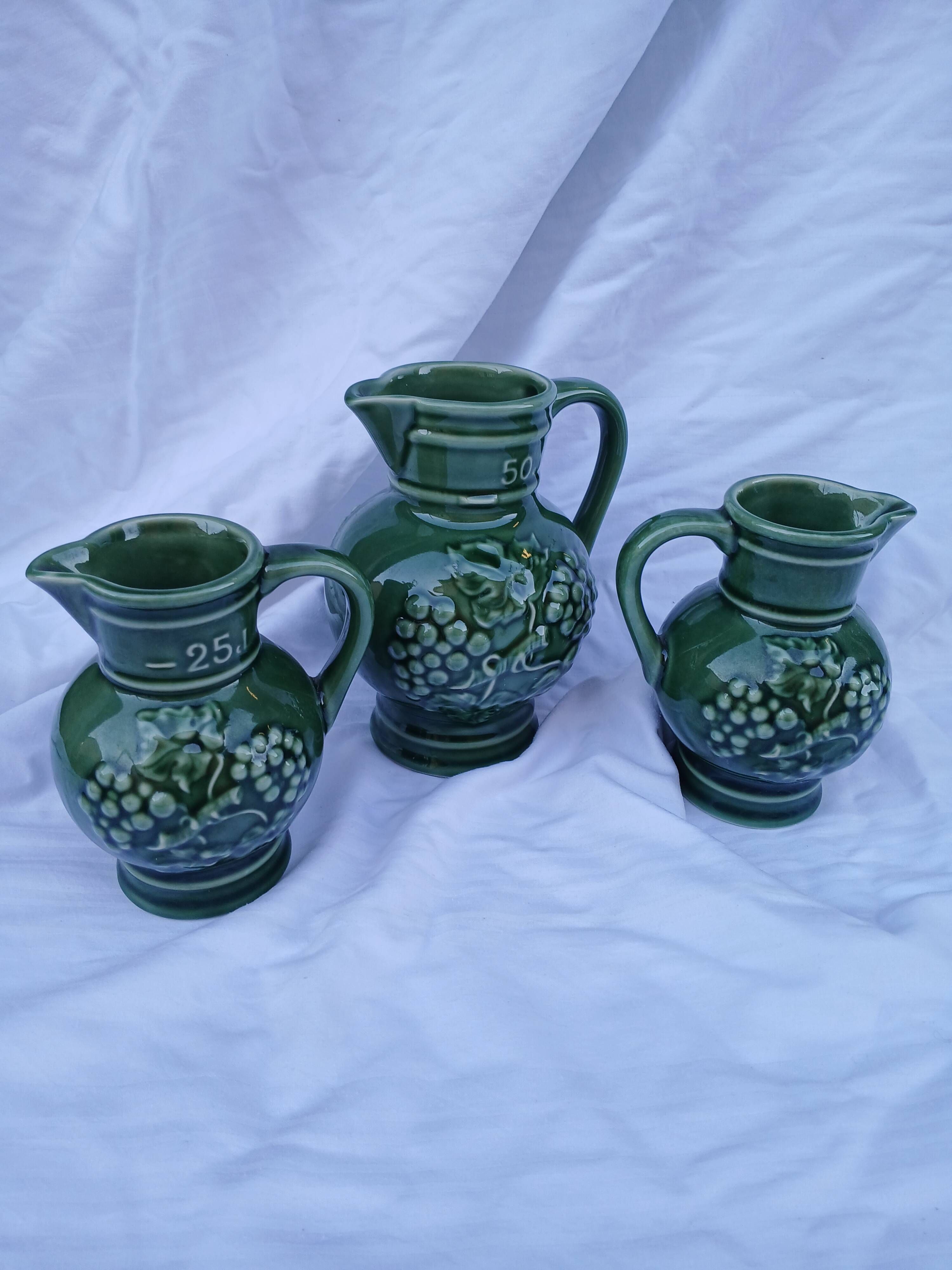 3 antique wine jugs
