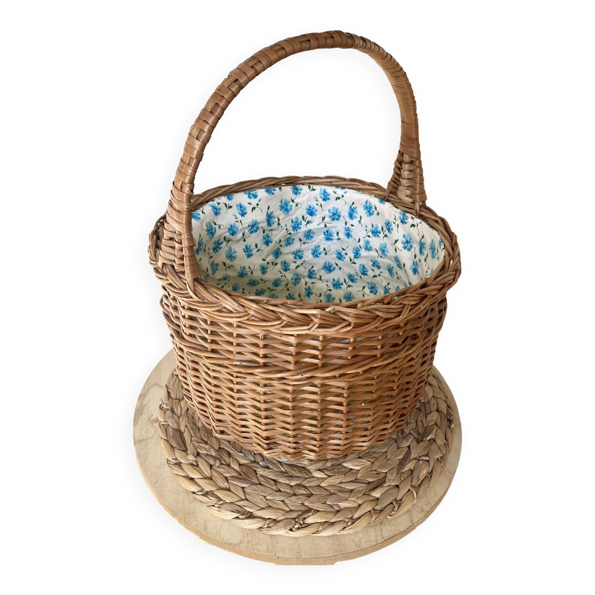 Wicker basket with waxed canvas blue flowers