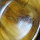 Teak or acacia wood bowl, vintage craftsmanship from the 70s to 2000s.