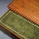 Burr Yew wood commode with leather top in Butler style