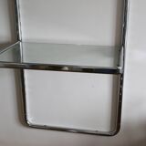 Chrome and glass wall shelf, circa 1960
