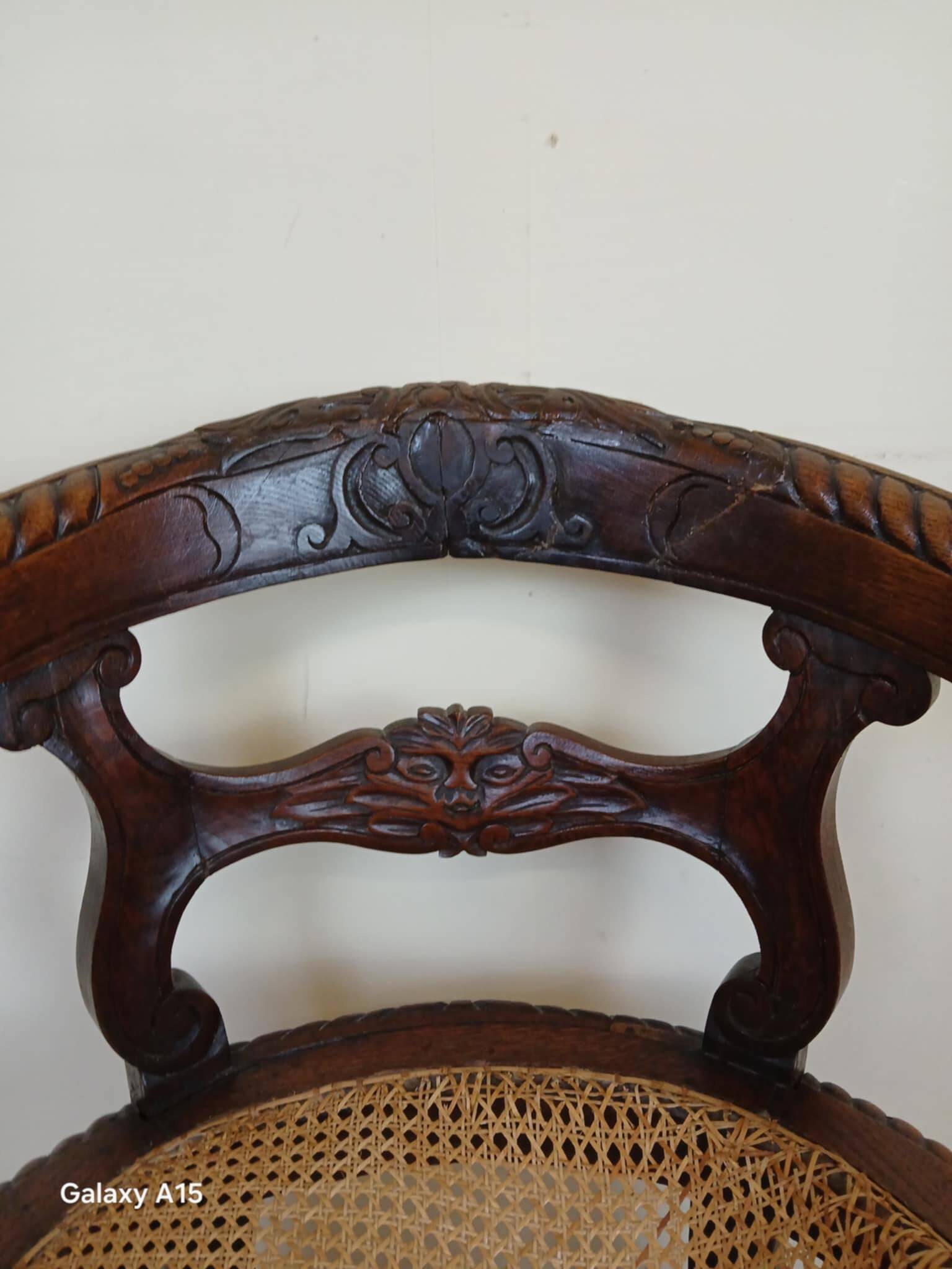 Renaissance style office chair in solid oak circa 1850