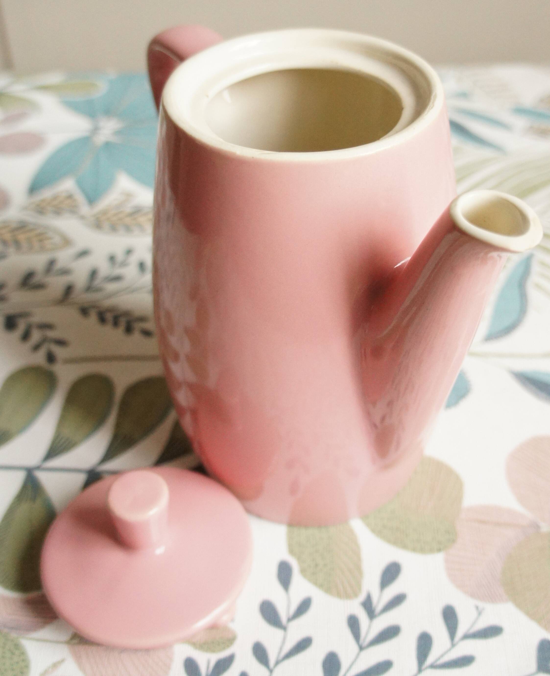 Pink porcelain coffee or teapot