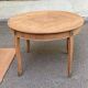 Round extendable dining table stripped in cherry wood with Louis XVI marquetry 1