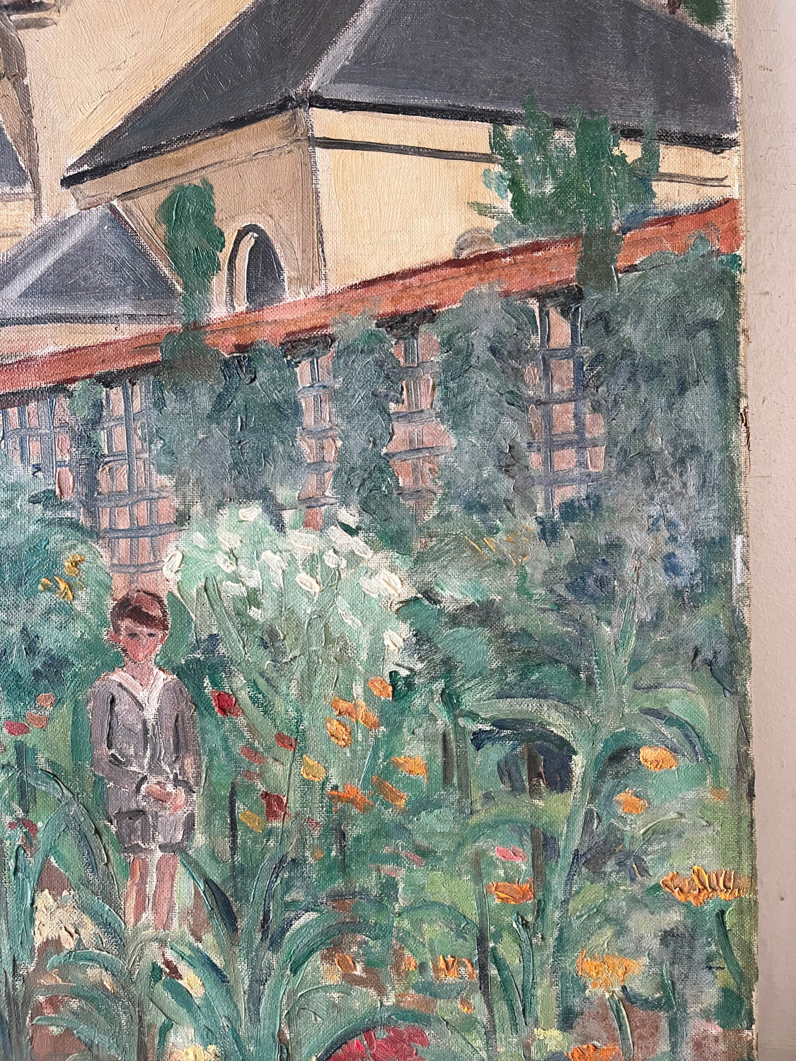 Country house with young man, signed Bernard Delafon
