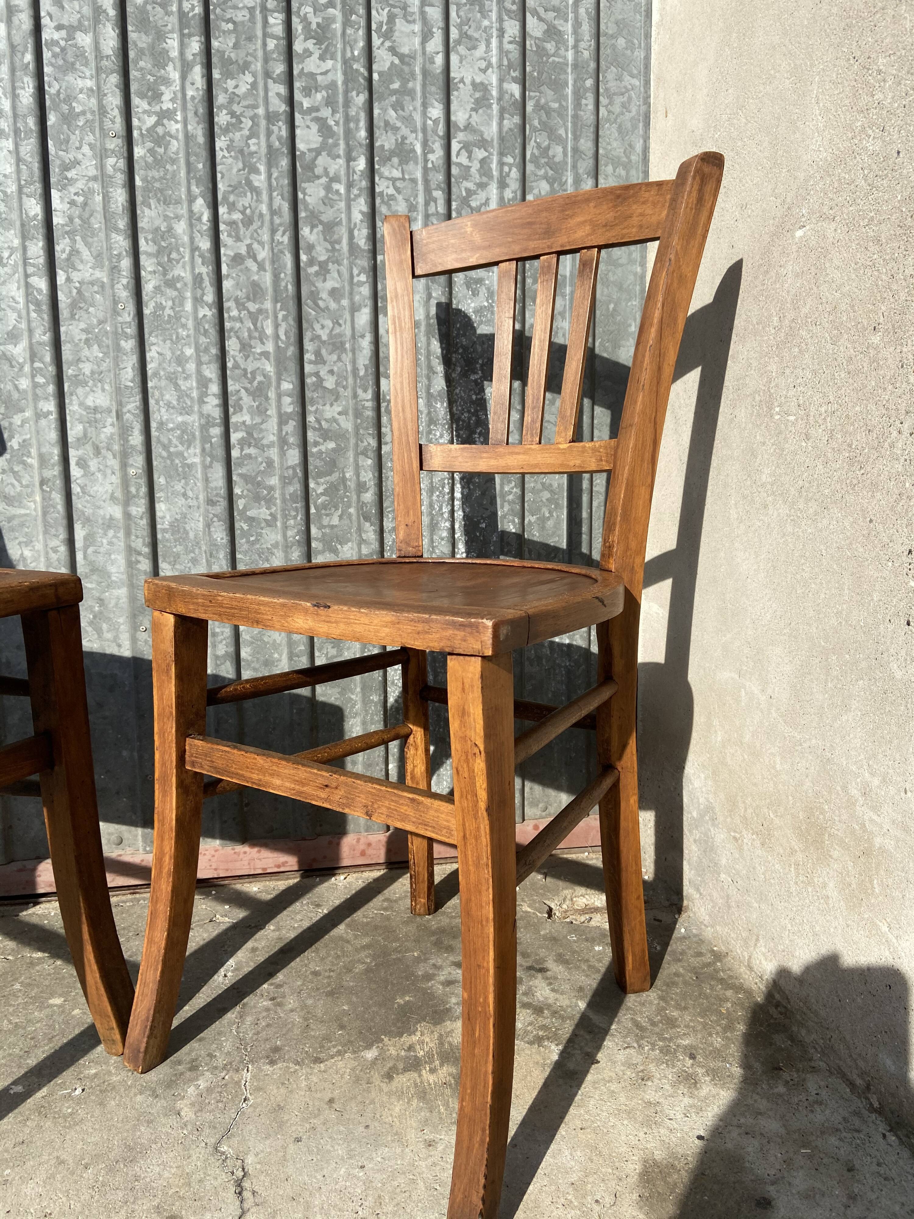 Pair of mismatched bistro chair