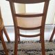 Set of 4 light wood bistro chairs stamped Baumann and Thonet.