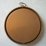 Old medallion frame bouquet of dried flowers glass and plastic retro decoration