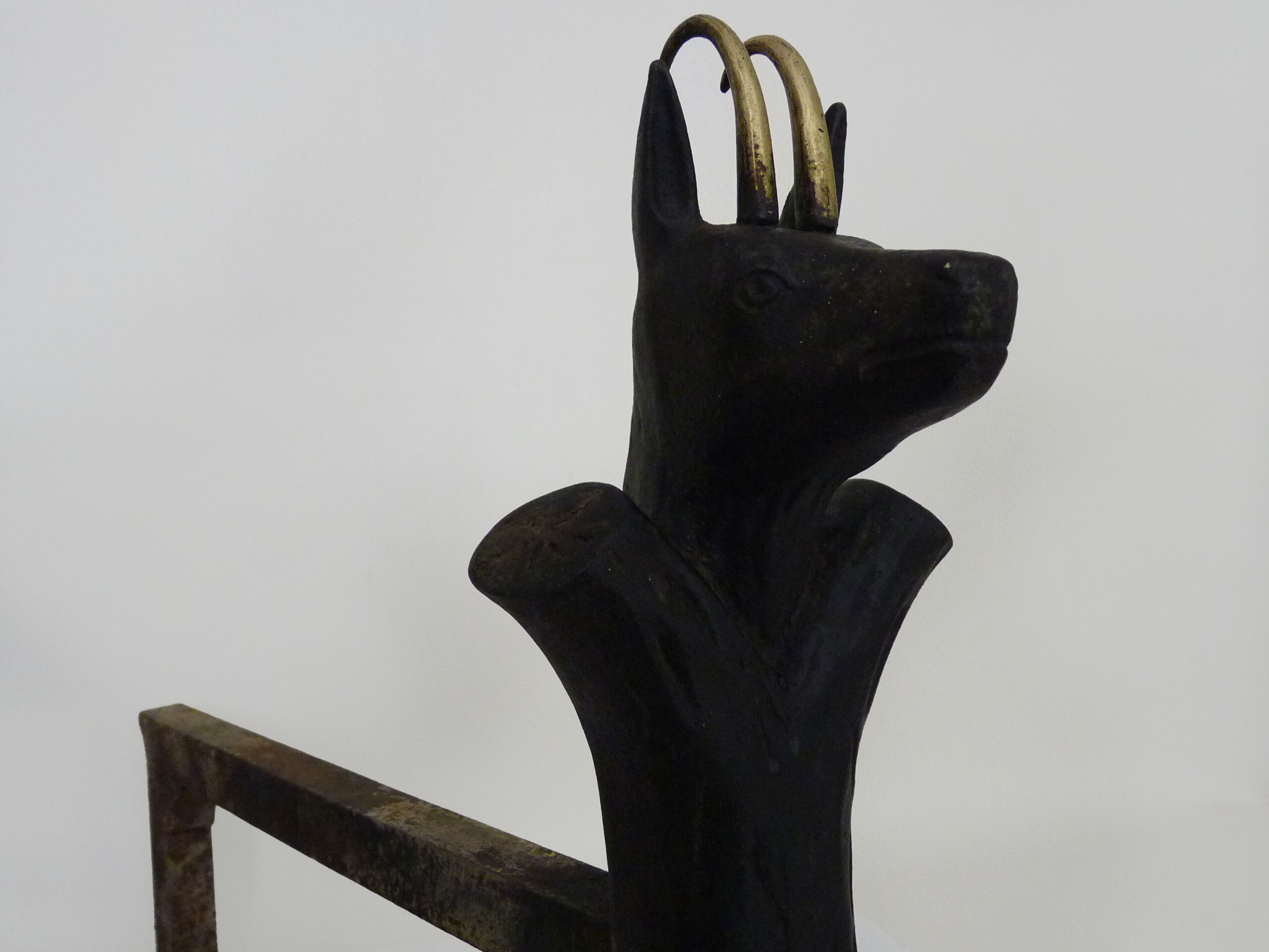 Pair of zoomorphic cast iron chimney pegs representing Isards. 50s