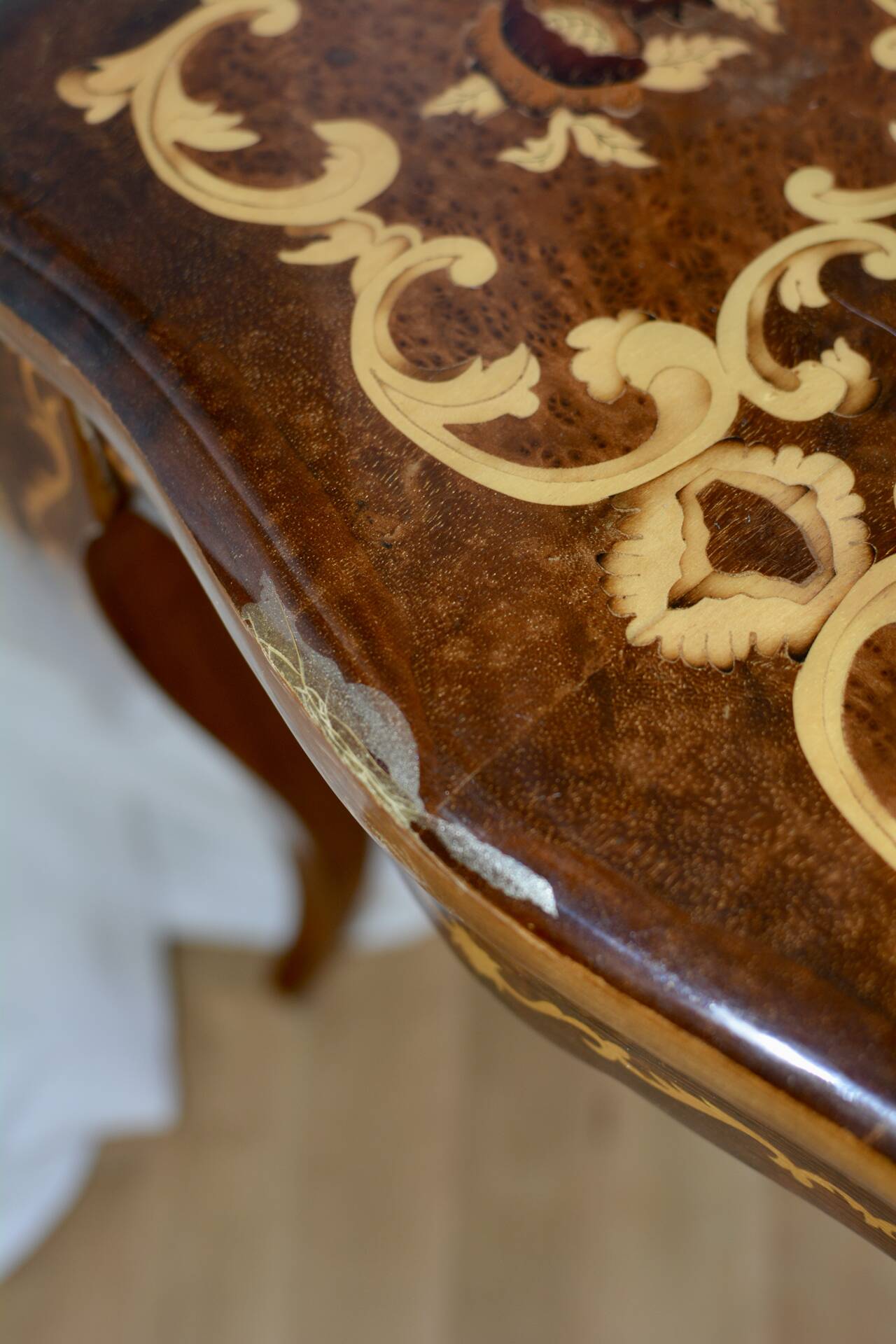 Antique coffee table with floral marquetry, Louis XV style.