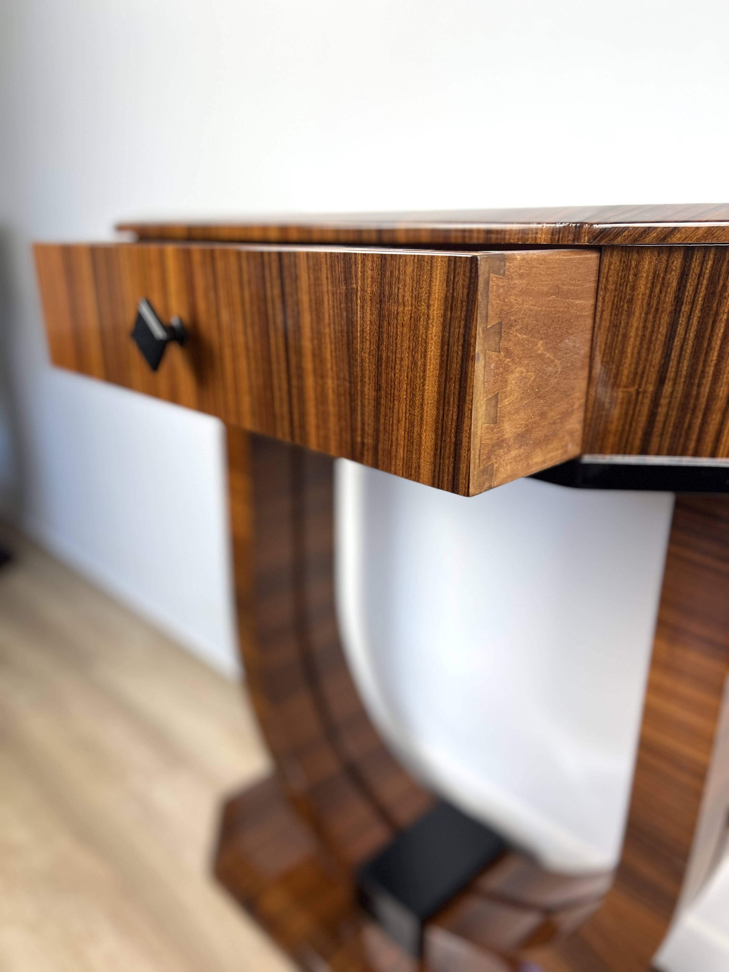 Art Deco rosewood console. Manufacturer.