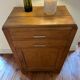 Small honey-coloured wooden buffet