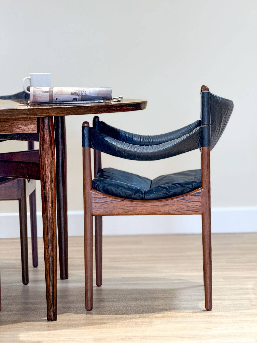 Extendable dining room table and chairs (by Kristian Solmer Vedel)