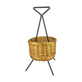 Black metal rattan trash can on 1960