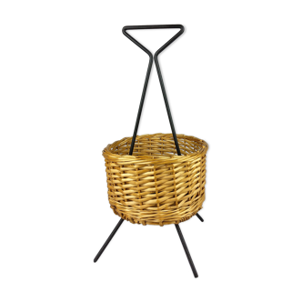 Black metal rattan trash can on 1960