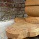Massive oval monastery table in bleached oak with turned legs.