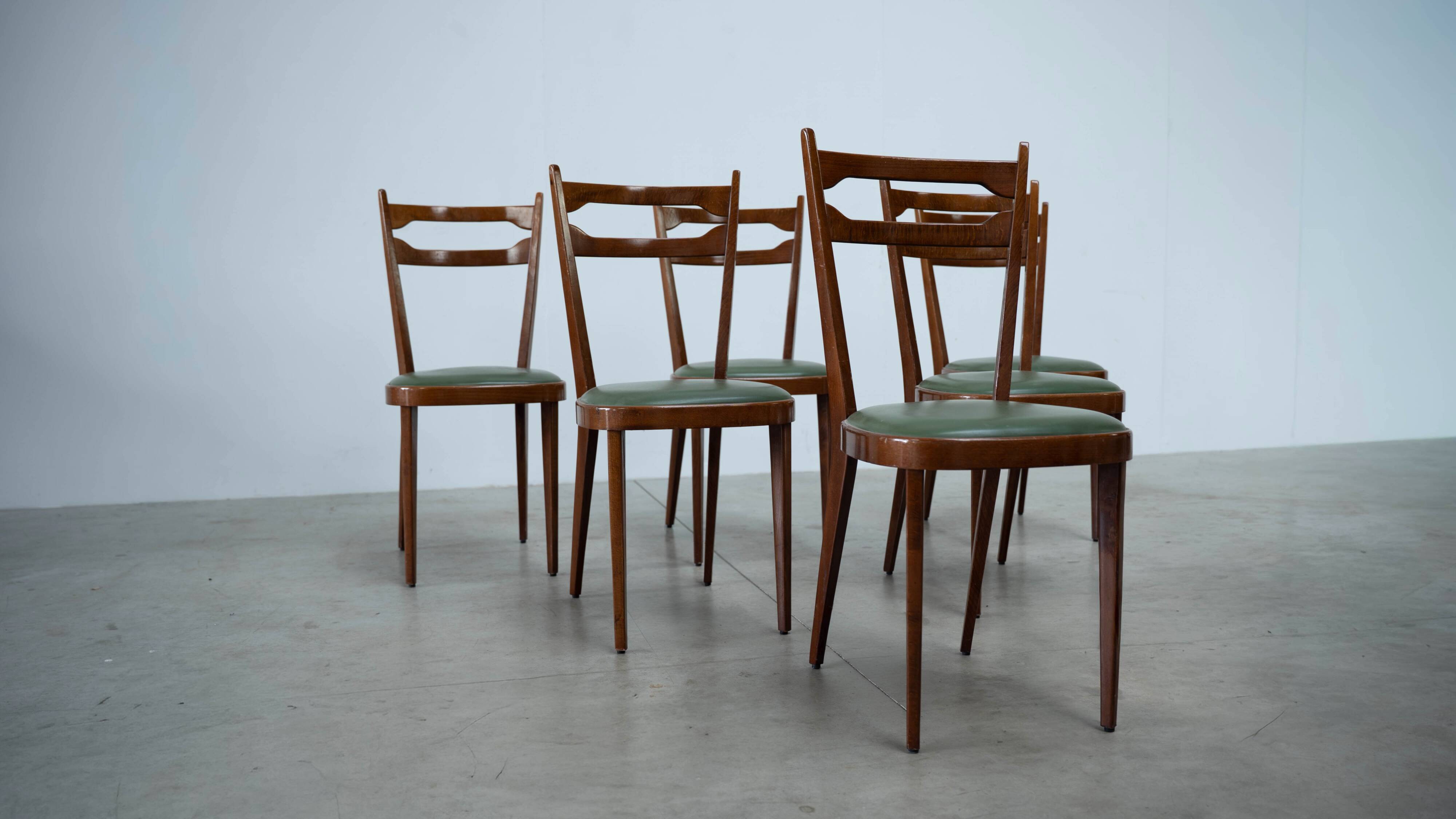 Set of six elegant Italian dining chairs