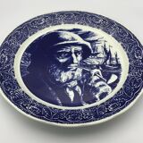 Blue enamelled earthenware wall plate with fisherman decor, Boch La Louvière, Belgium