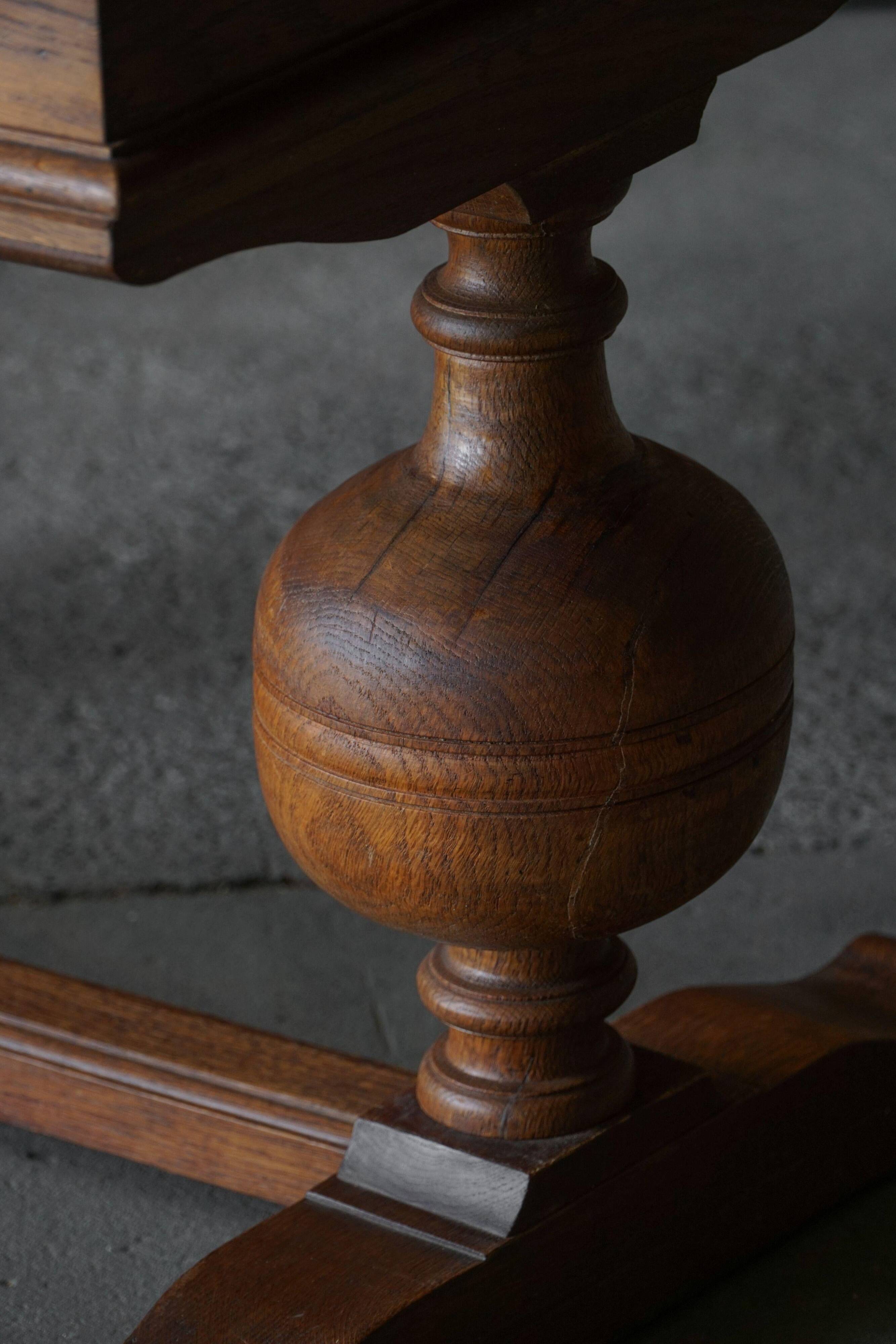 Baroque writing desk from the 1920s in solid oak, by a Danish cabinetmaker.