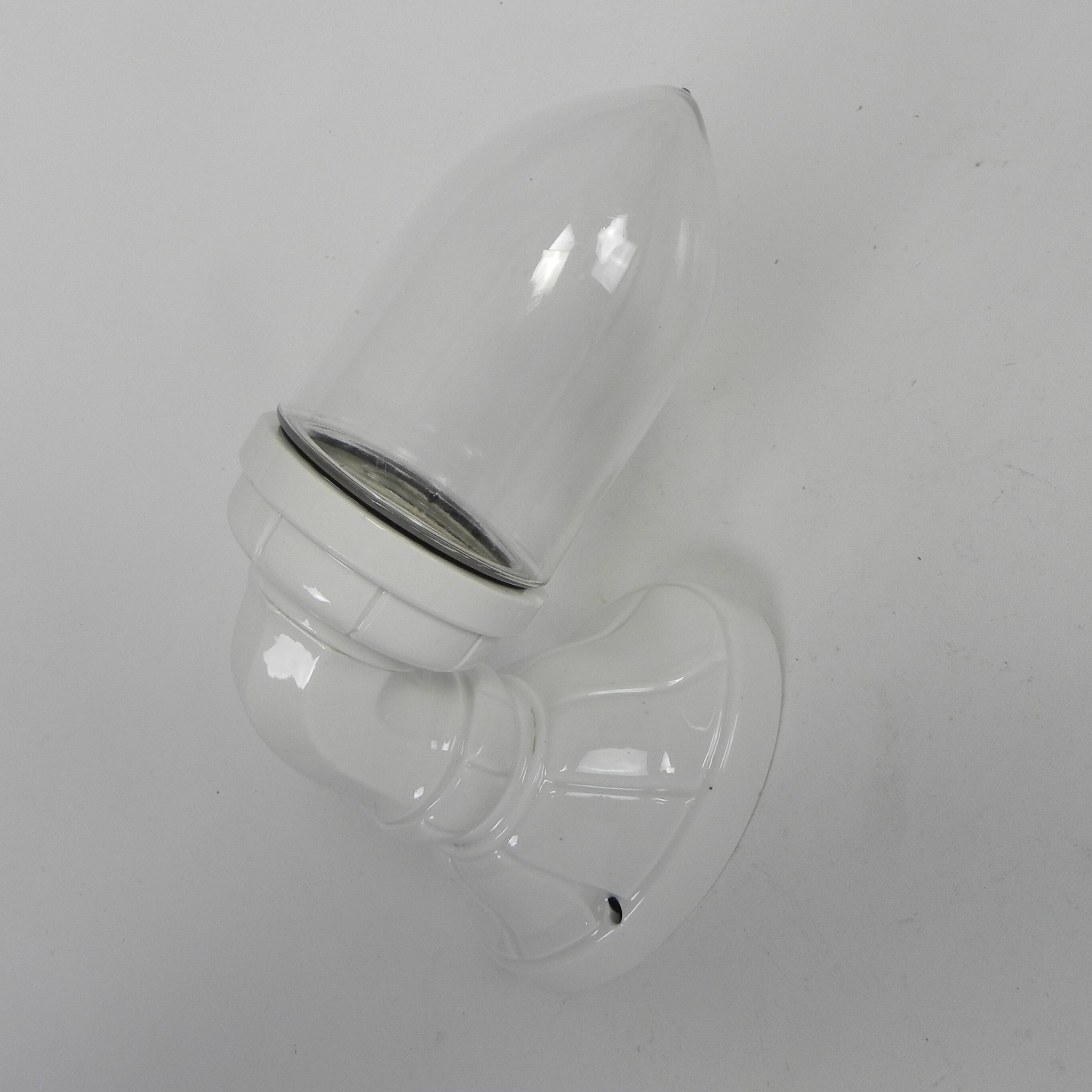 Wall lamp in porcelain with a transparent glass shade, 1930s.