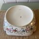 Old hollow porcelain dish with floral decoration and gold trim