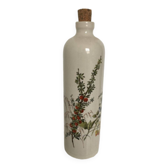 Glazed stoneware bottle with flower decorations. Stamped Digoin