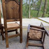 6 dining chairs in a country or farmhouse style, made of dark solid wood and rush-seated.