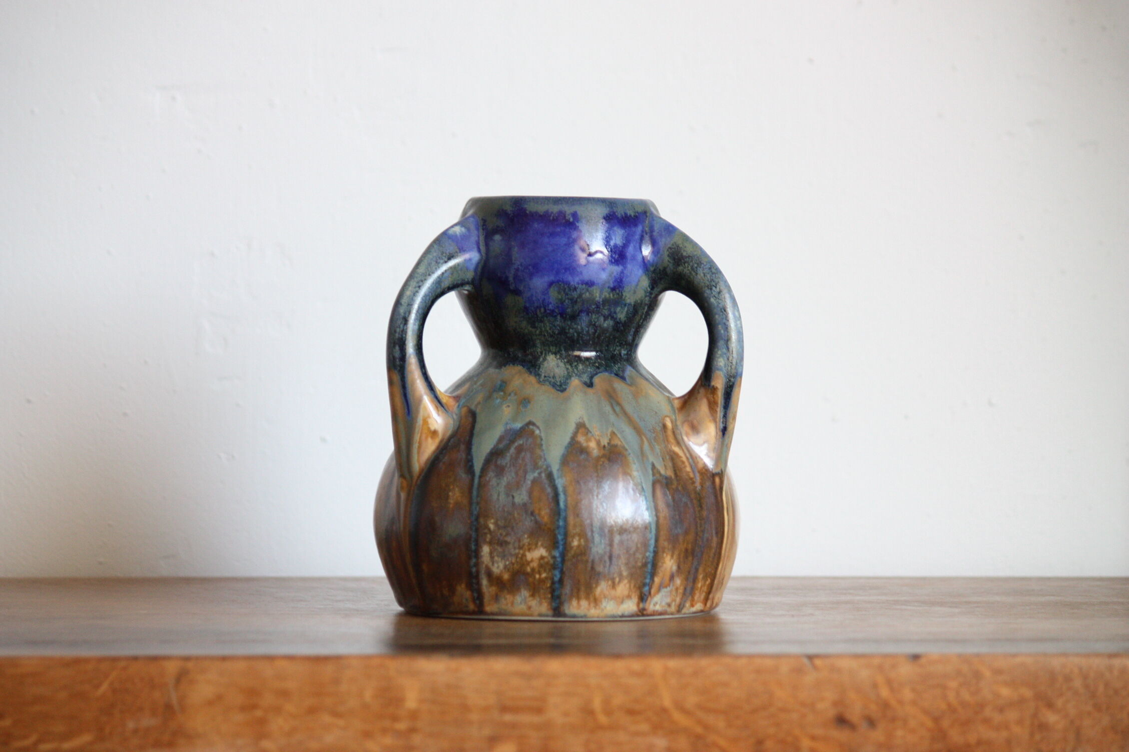 Blue vase in flaming sandstone