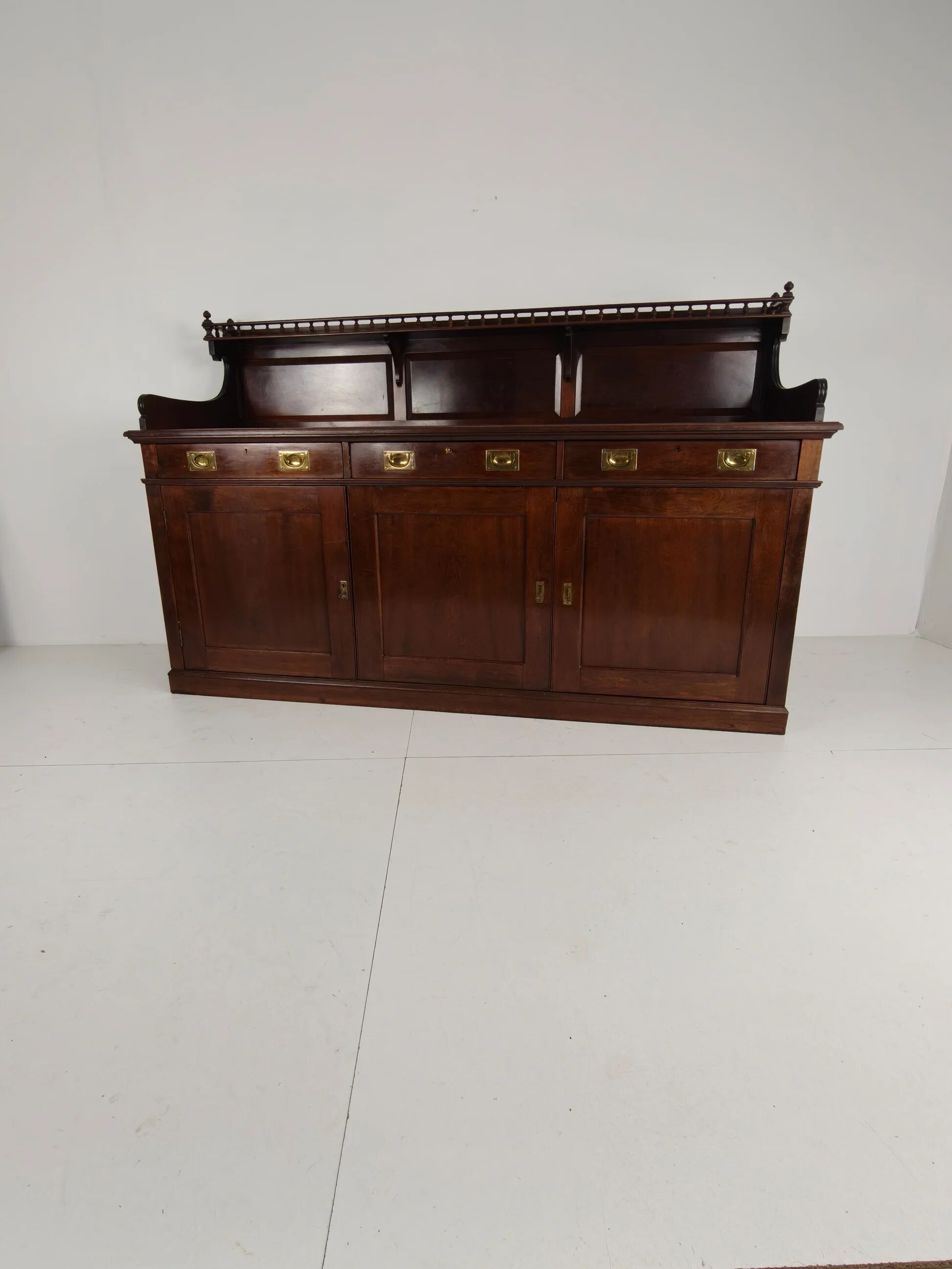 Early 20th-century English mahogany dresser / sideboard – brass campaign hardware