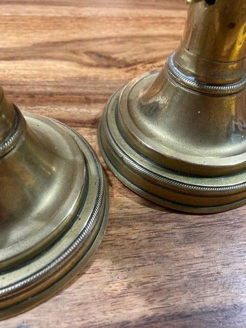 Pair of 19th-century brass pusher candlesticks